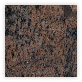 Texture de granit brun avec des nuances sombres.